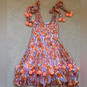 Chic Floral Sundress with Pom-Poms
